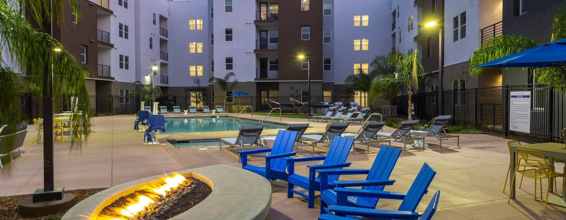 a pool with chairs around it