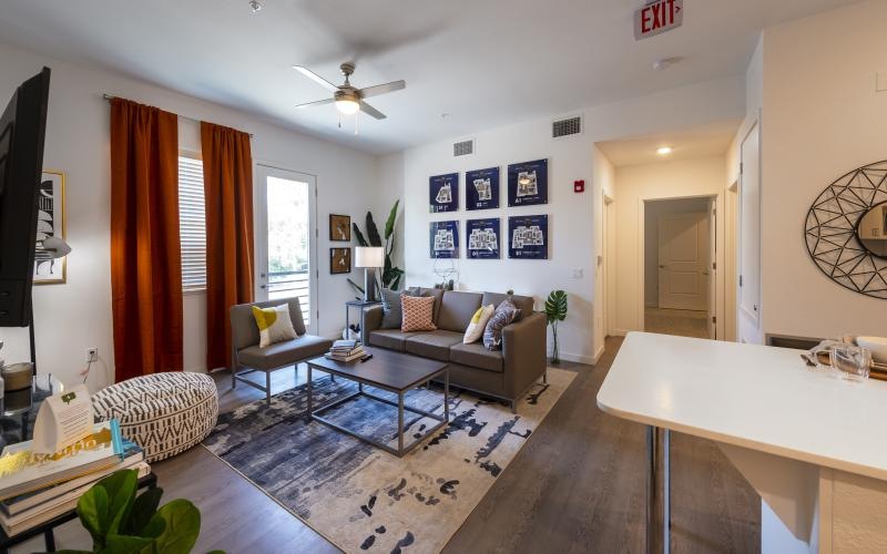 a living room with a couch and a table